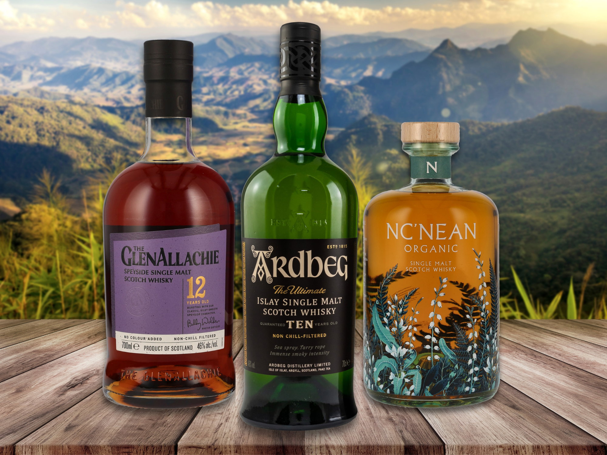 GlenAllachie 12 Years Old Speyside Single Malt Whisky, Ardbeg Ten Islay Single Malt Scotch Whisky, NC'NEAN Organic Single Malt Whisky im Bergpanorama